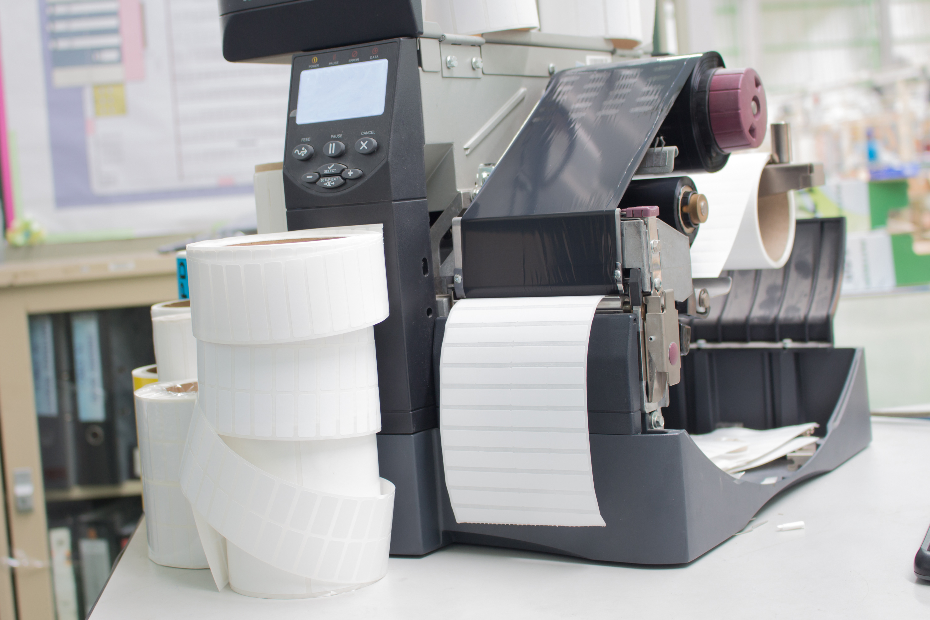 direct thermal printer with rolls of labels