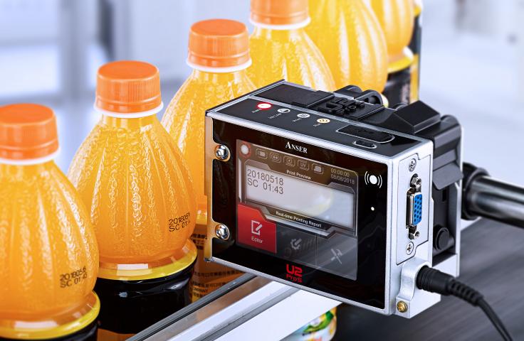 Image Showing No-Contact Inkjet Printing on Soda Bottles